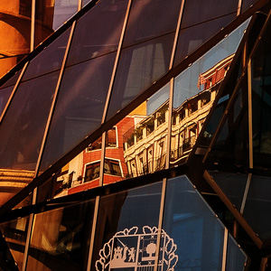 image from "Reflection glass building and sunbeams" by kfphotography